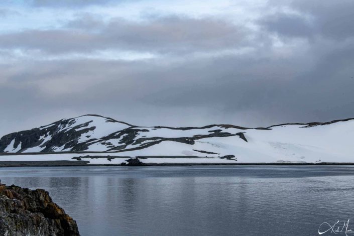 Best scenic photo of snow covered mountains and silvery sea waters, Half moon island