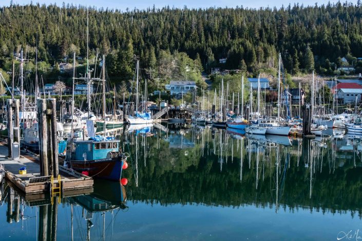 Best photo with reflection of boats in the water at the harbour