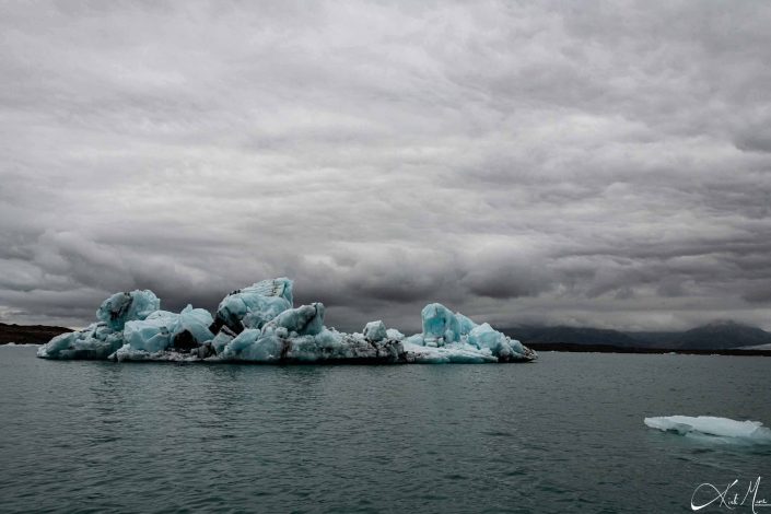 Best close-up photo of a iceberg, with blue and black layers