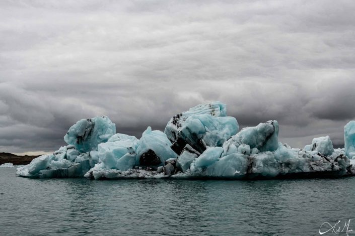 Best close-up photo of a iceberg, with blue and black layers