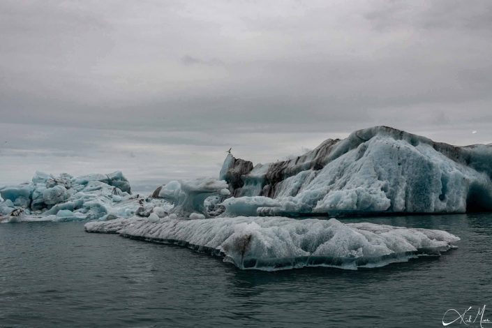 Best close-up photo of a iceberg, with blue and black layers