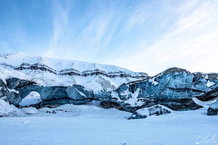 Beautiful photo of icy rocks at a glacier