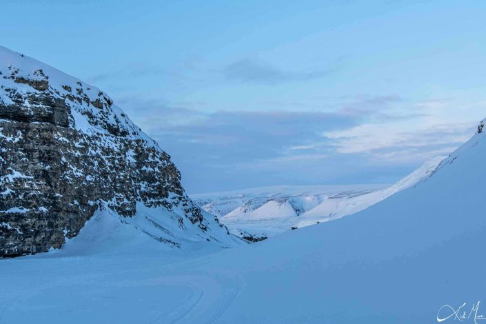 Scenic photo of a path in snow covered landscape