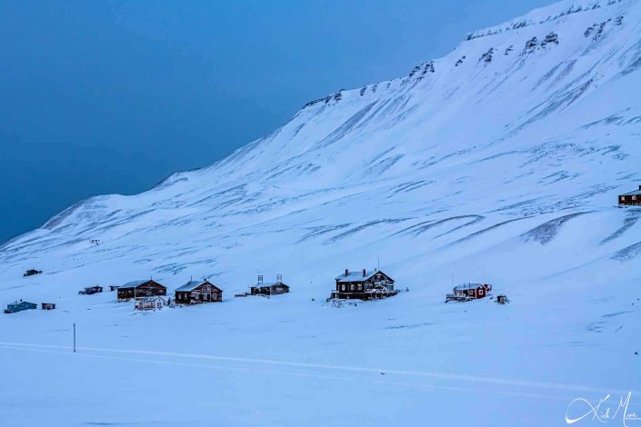 Best scenic photo of snow covered landscape with houses